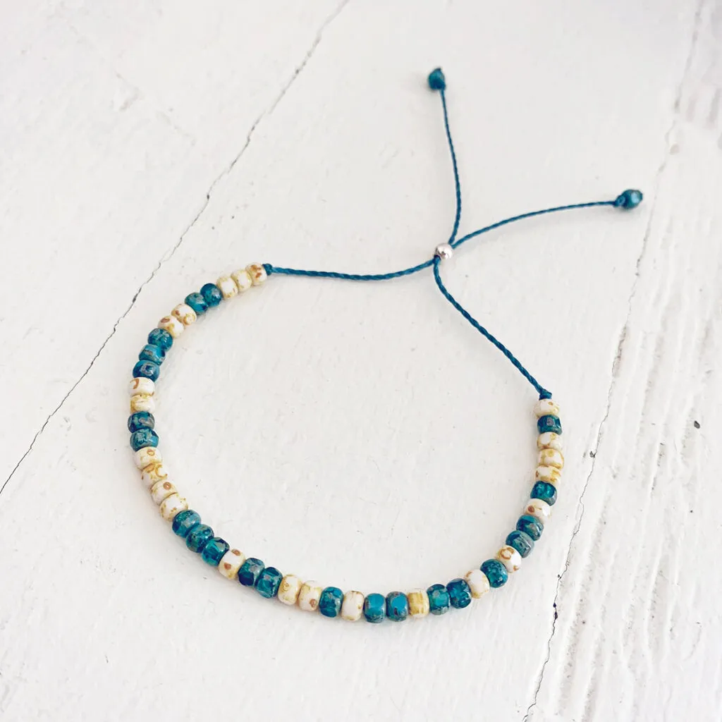 beach side // turquoise blue and white beaded cord bracelet