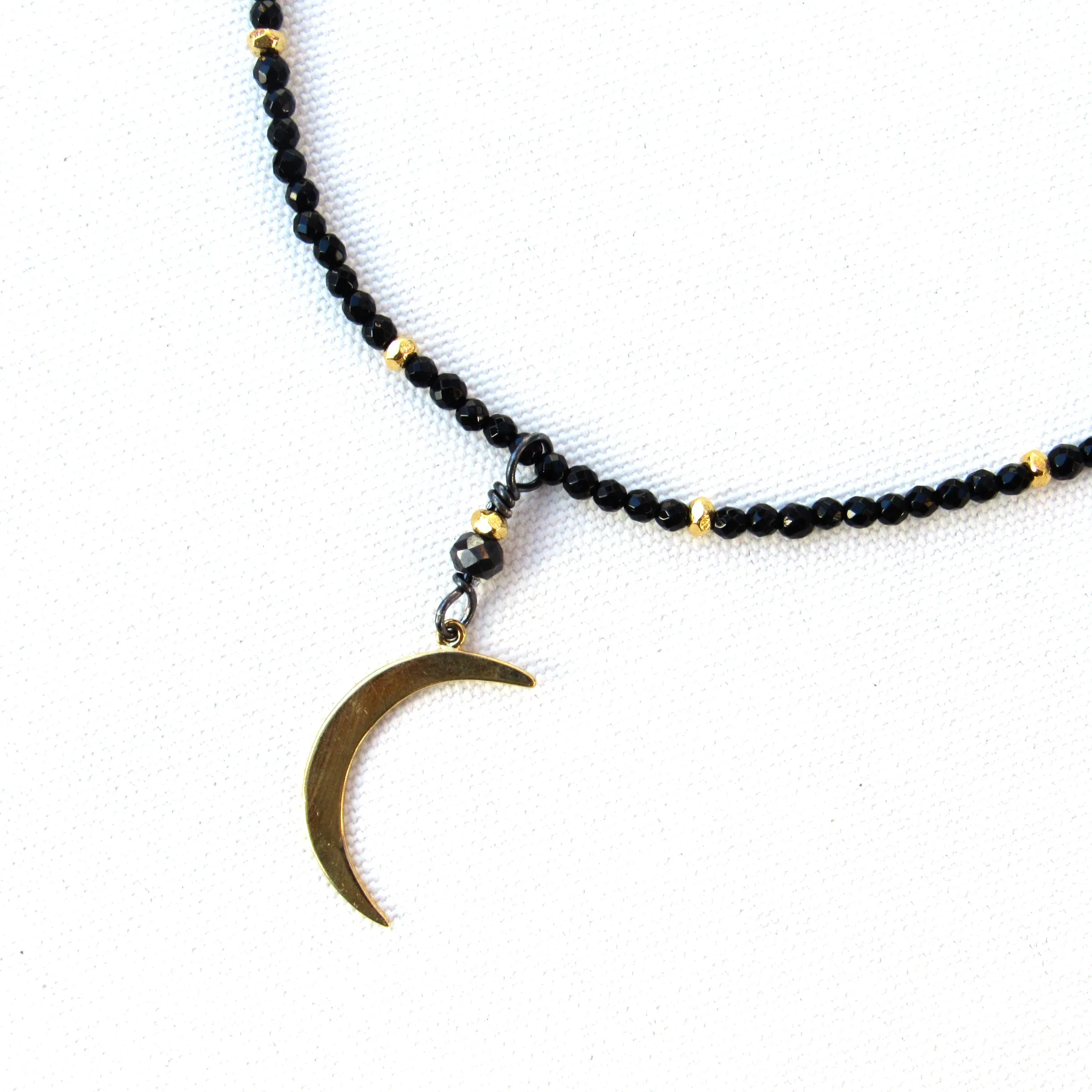 Black onyx, gold vermeil over sterling silver Moon and beads. Black non conflict diamond